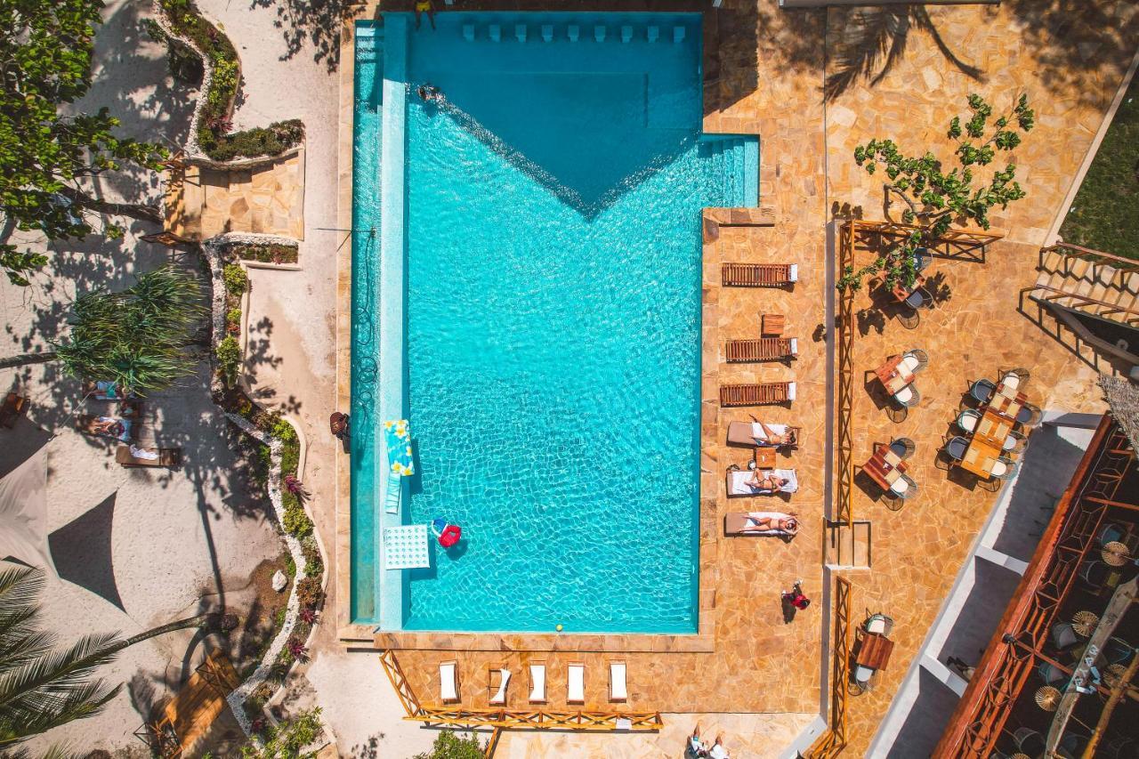 Zanzibella Hotel & Spa Кивенгва Экстерьер фото Aerial view of a swimming pool