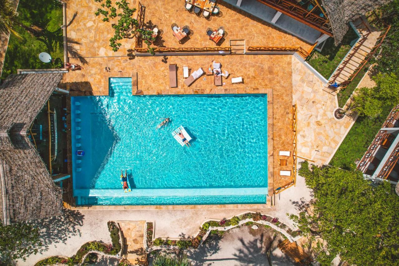Zanzibella Hotel & Spa Кивенгва Экстерьер фото Aerial view of the swimming pool at the Hotel