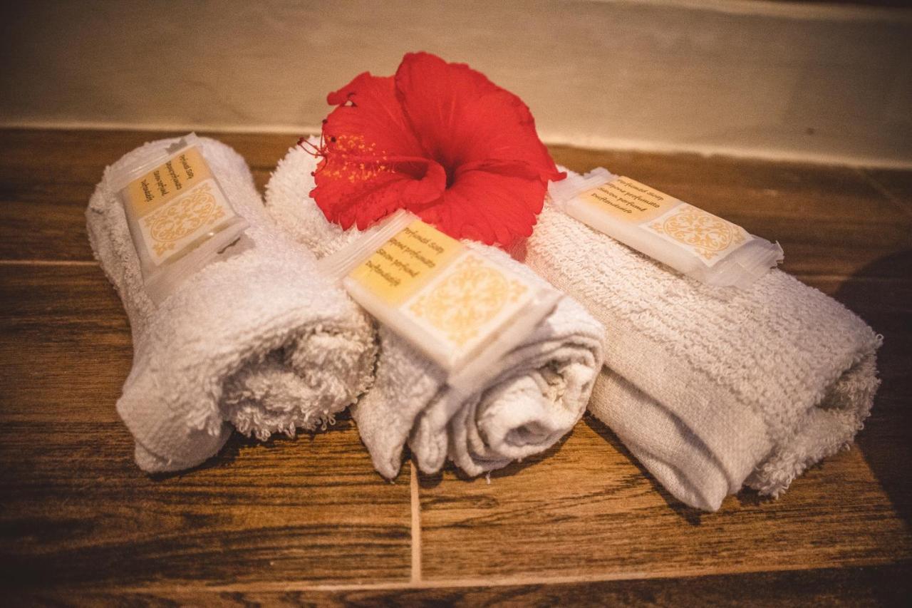 Zanzibella Hotel & Spa Кивенгва Экстерьер фото A set of towels and soap